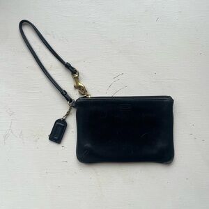 Coach black leather wristlet with gold hardware
